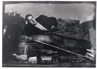 Portrait of Guillaume Apollinaire (1880-1918) reclining, c.1910 by French Photographer